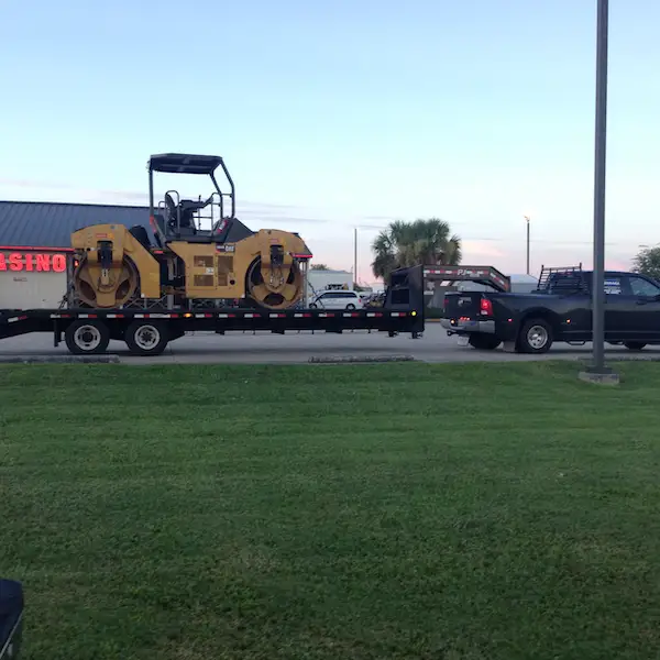 ferrara transportation services hauling construction equipment for road project